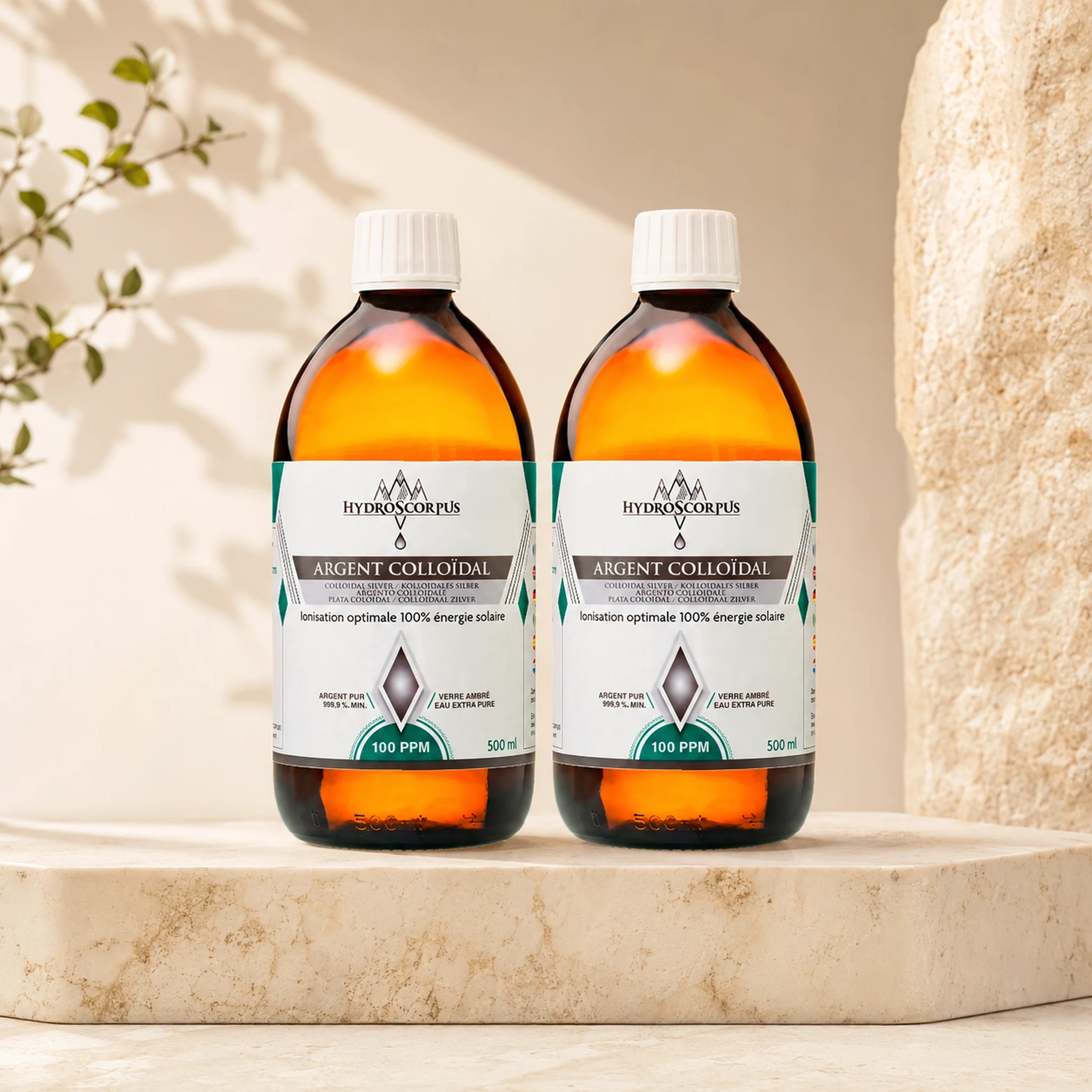Lot de 2 bouteilles d’argent colloïdal Hydroscorpus 100 PPM en verre ambré 500 ml en vue alternative.