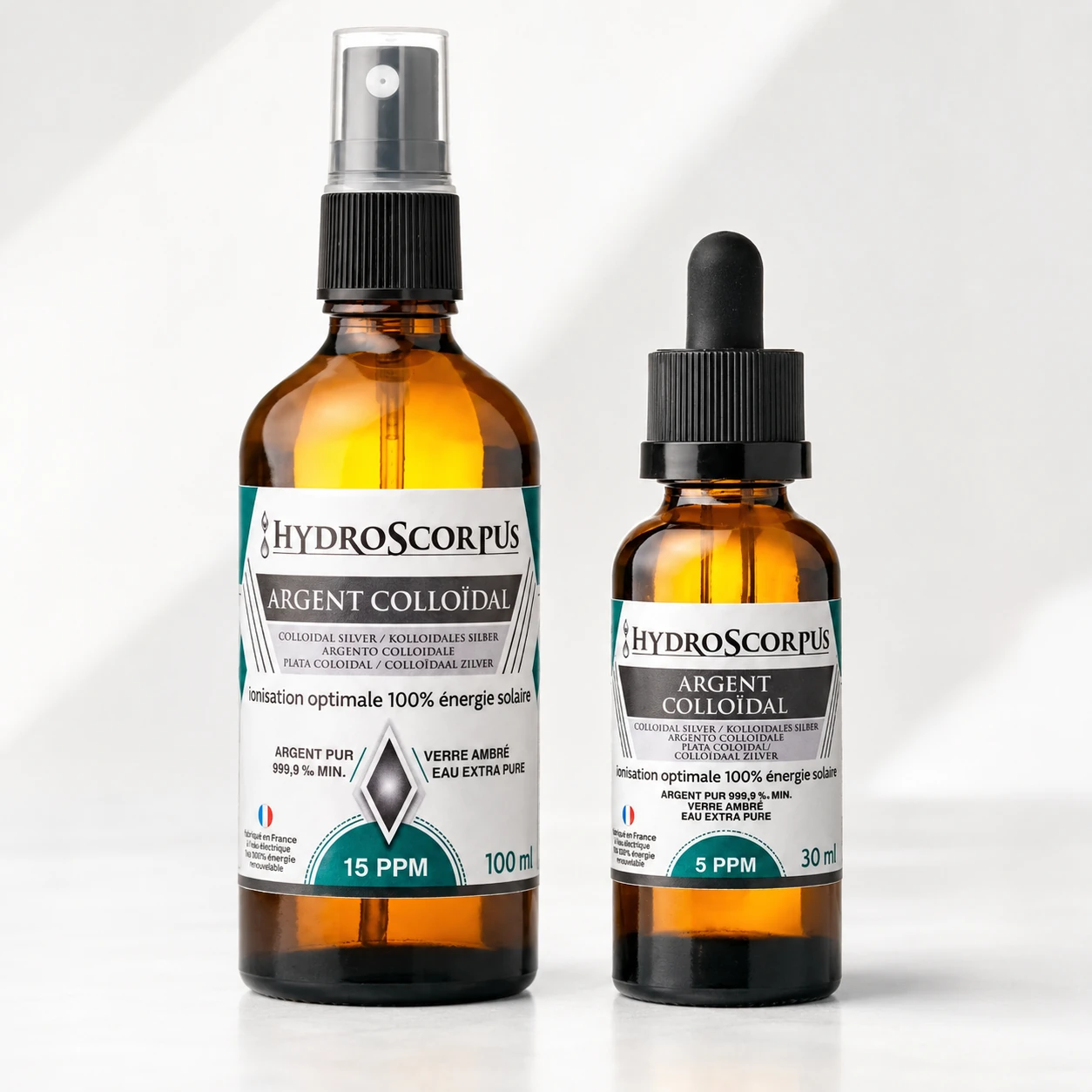 Pack Hydroscorpus avec flacon spray 15 PPM 100 ml et flacon compte-gouttes 5 PPM 30 ml en vue studio.