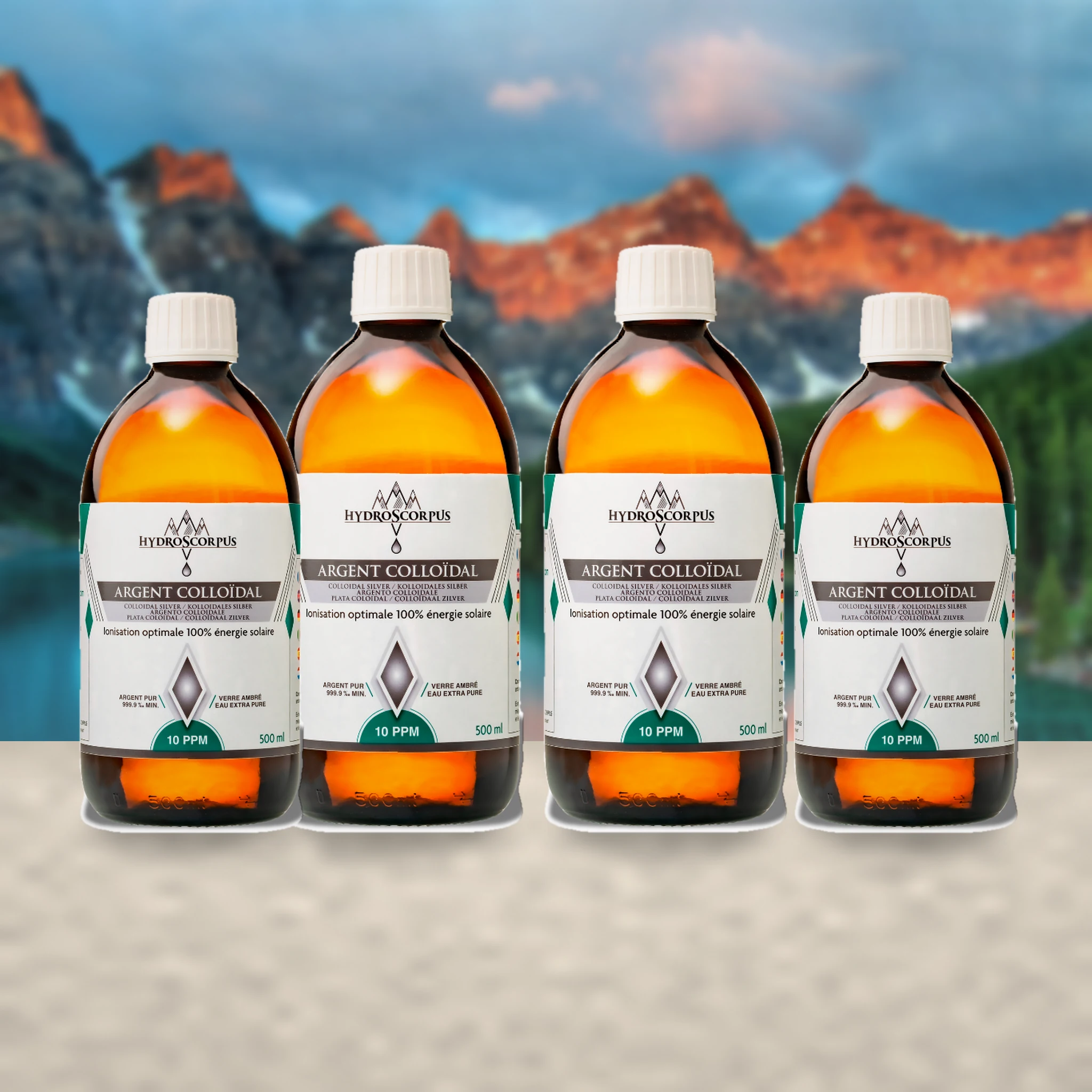 Lot de quatre bouteilles Hydroscorpus de 500 ml d’argent colloïdal 10 PPM dans une ambiance naturelle.